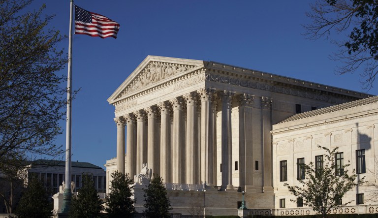 The Supreme Court on Monday dropped the dispute over President Trump's travel ban from its oral argument calendar. (AP Photo/J. Scott Applewhite)