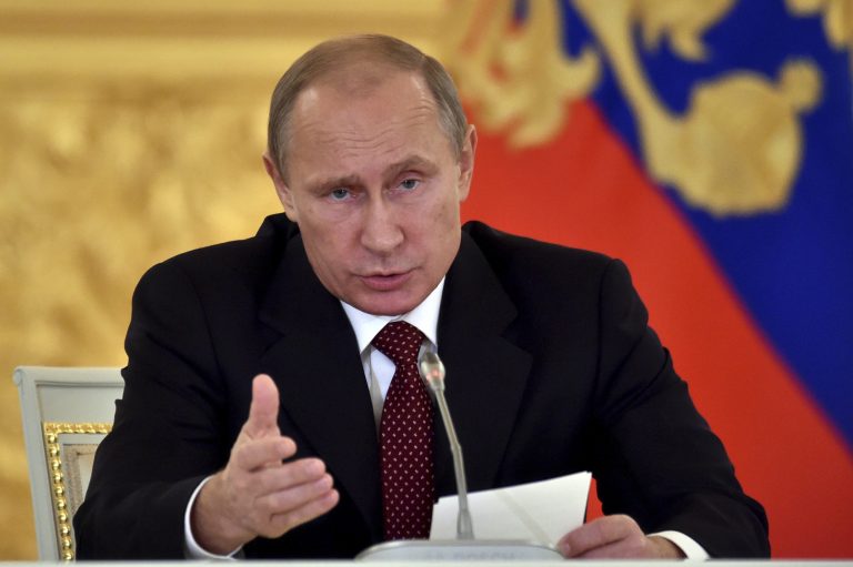 Russian President Vladimir Putin heads the Human Rights Council in Moscow's Kremlin, Russia, Tuesday, Oct. 14, 2014. (AP Photo/Kirill Kydryavtsev, Pool)