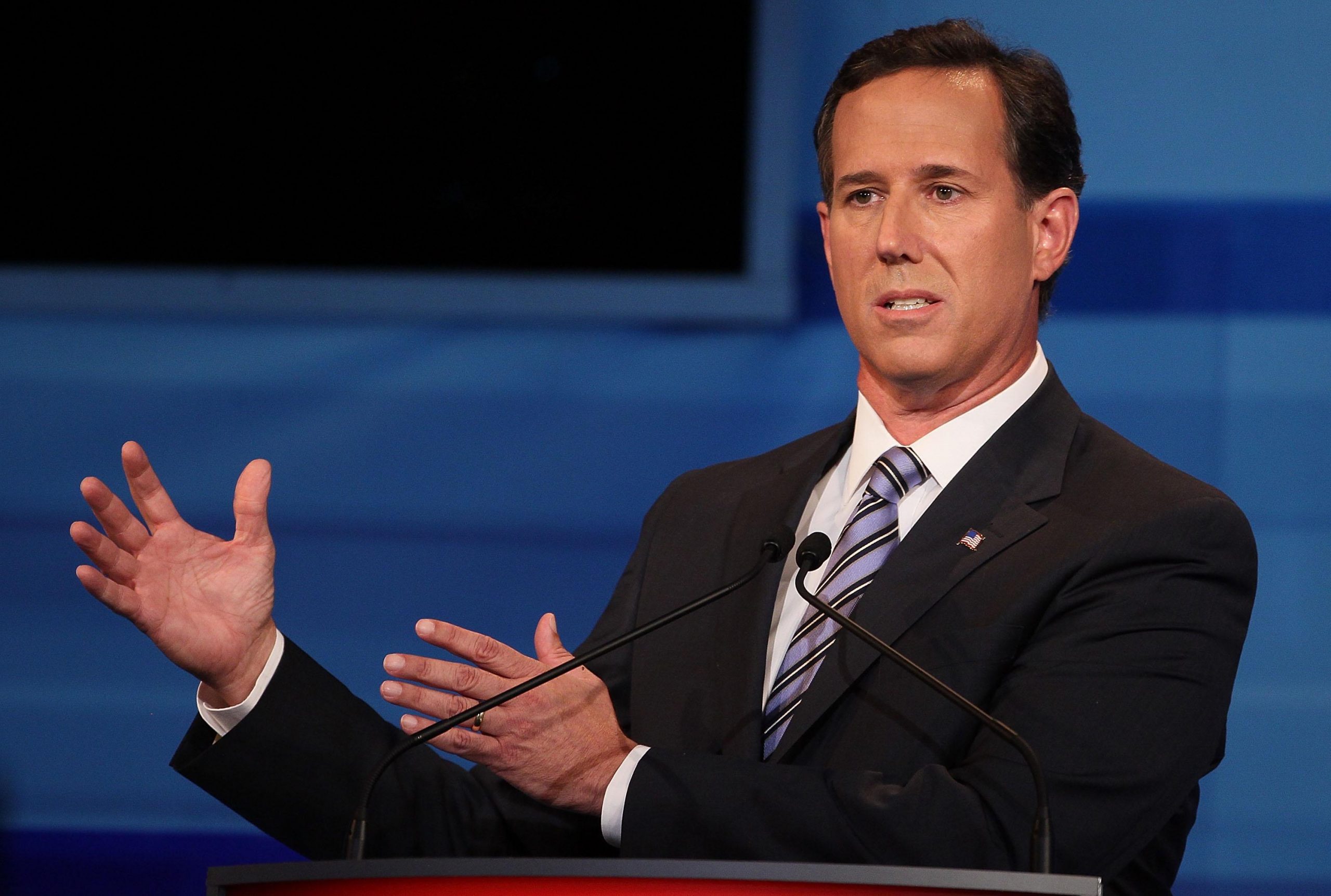 While frontrunners feud, Santorum wins GOP debate
