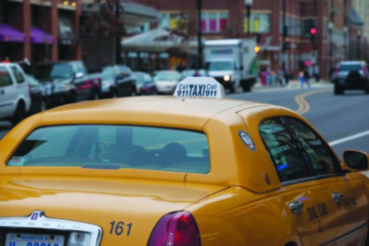 Graeme Jennings/Examiner File
Yellow taxis could be a thing of the past in the District after a panel recommended Wednesday that all D.C. cabs should be painted red by 2018.