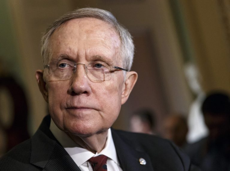 FILE - This April 29, 2014 file photo shows Senate Majority Leader Harry Reid of Nev. talking to reporters on Capitol Hill in Washington. A bill to renew a package of more than 50 expired tax breaks cleared its first hurdle in the Senate Tuesday. Other hurdles remain, however. The Senate voted 96 to 3 to open debate on the bill, which has strong backing from the business community but would add about $85 billion to the budget deficit. Almost every year, Congress routinely renews the tax breaks. This year, though, they were allowed to expire at the start of the year. The Senate bill would extend the tax breaks through 2015.  (AP Photo, File)