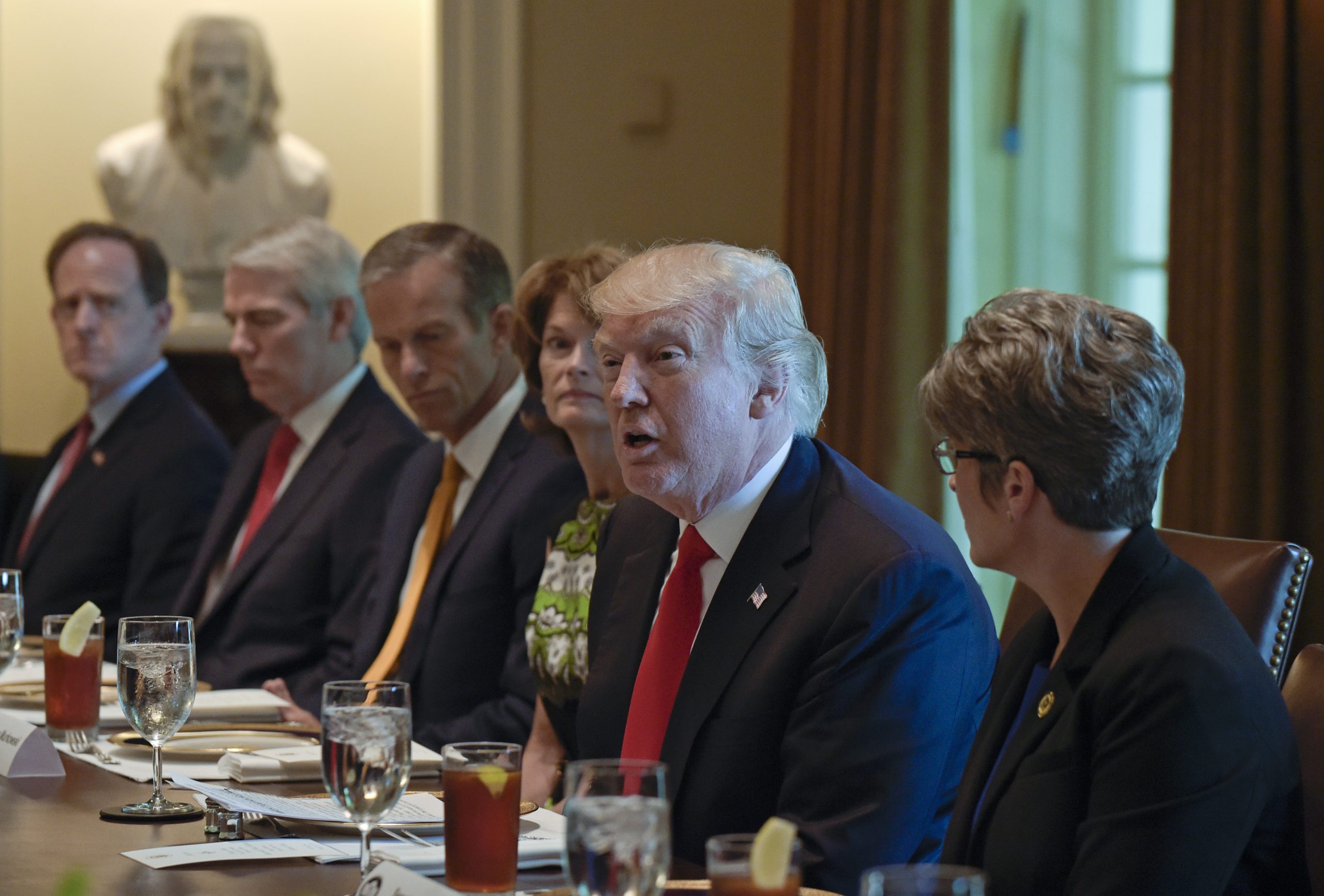 Trump, Republican senators try to revive stalled agenda amid distractions