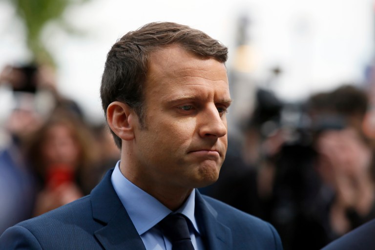 French centrist presidential candidate Emmanuel Macron will face Marine Le Pen, who wants to lift economic sanctions imposed on Russia. (AP Photo/Francois Mori)