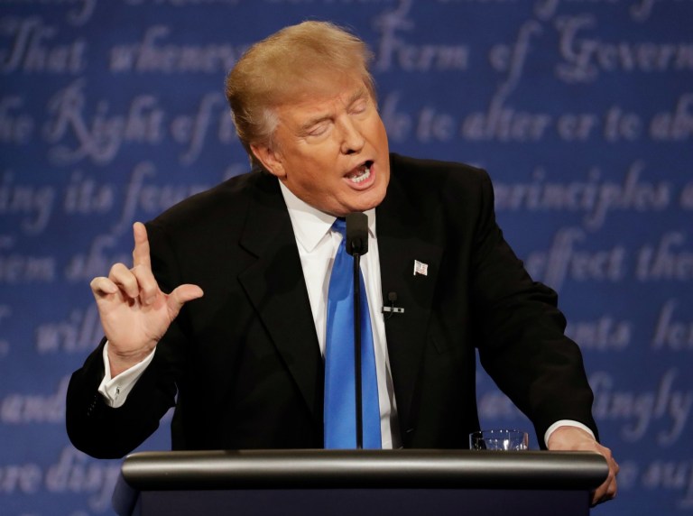 Hillary Clinton demanded Monday that Donald Trump apologize to the thousands of people of people his company has stiffed through the years by not paying for services rendered. (AP Photo/Patrick Semansky)