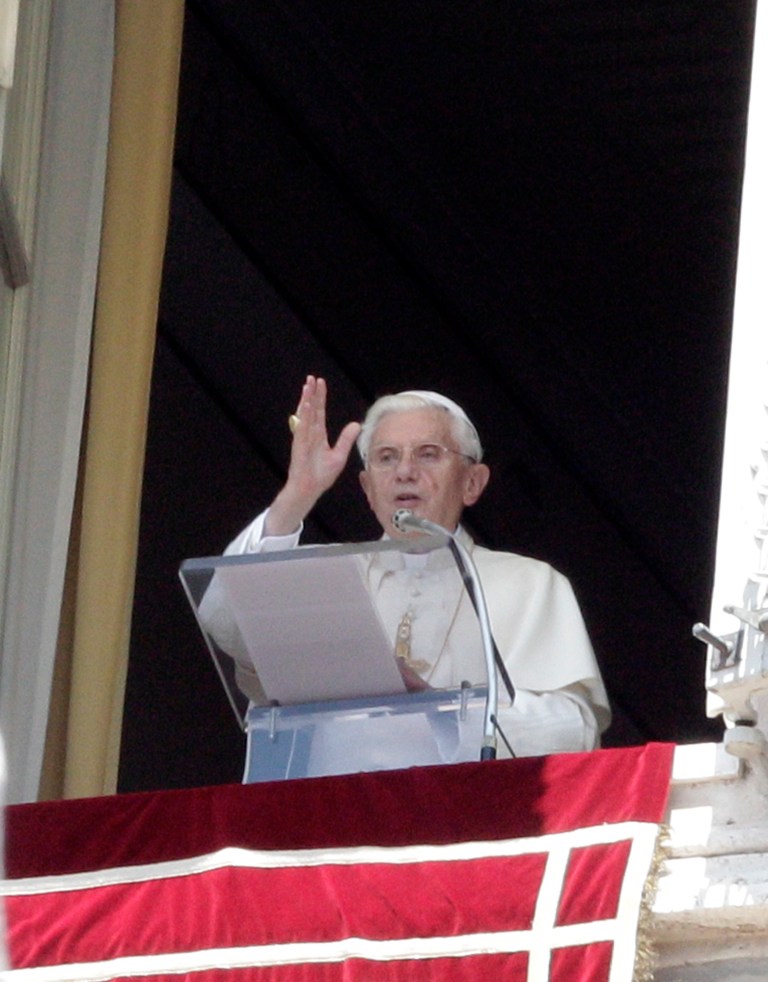   Pope Benedict XVI delivers his blessing during the Angelus prayer from his studio overlooking St. Peter's square at the Vatican, Sunday, June 17, 2012. (AP Photo/Riccardo De Luca)  