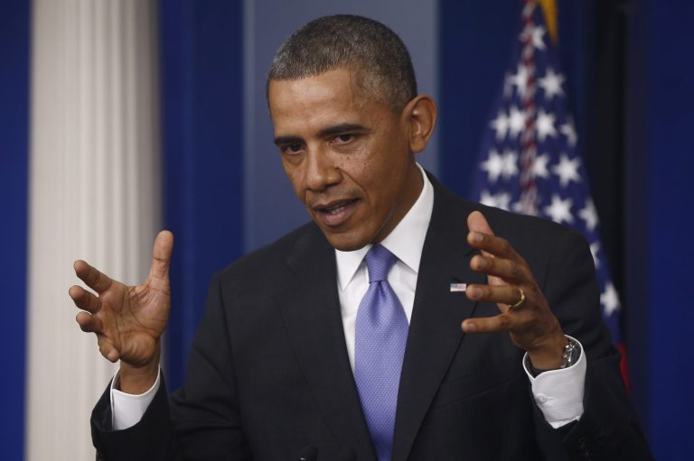 President Barack Obama gestures as he speaks about his signature health care law, Thursday, Nov. 14, 2013, in the Brady Press Briefing Room of the White House in Washington. Bowing to pressure, President Barack Obama intends to permit continued sale of individual insurance plans that have been canceled because they failed to meet coverage standards under the health care law, officials said Thursday. (AP Photo/Charles Dharapak)