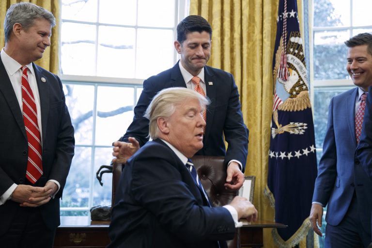 President Trump and House Speaker Paul Ryan, center, have begun to repeal Obama era regulations. (AP Photo/Evan Vucci)