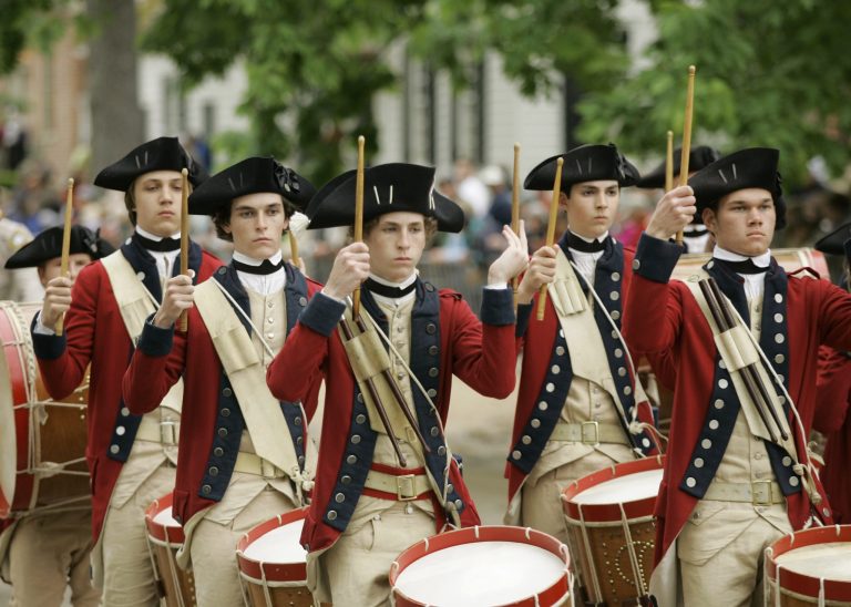 Members of the Colonial Williamsburg Fifes and Drums march at historic Colonial Williamsburg, Va., Thursday, May 3, 2007. (AP Photo/Gerald Herbert)