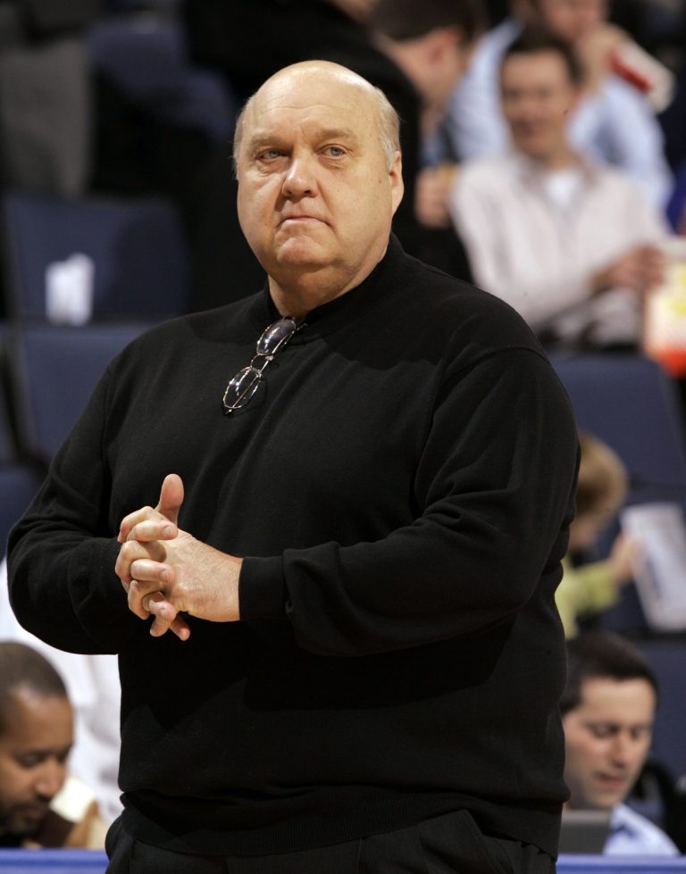   FILE - In this Jan. 14, 2009, file photo, Saint Louis coach Rick Majerus stands on the sidelines during the first half of an NCAA college basketball game against Massachusetts in St. Louis. Majerus, the jovial college basketball coach who led Utah to the 1998 NCAA final and had only one losing season in 25 years with four schools, died Saturday, Dec. 1, 2012. He was 64. (AP Photo/Jeff Roberson, File)  