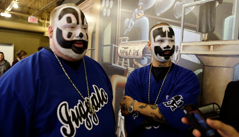 Juggalos, known for their sometimes jarring black and white face paint, are protesting their designation as a criminal gang in a 2011 FBI report. (AP Photo/Carlos Osorio, File)