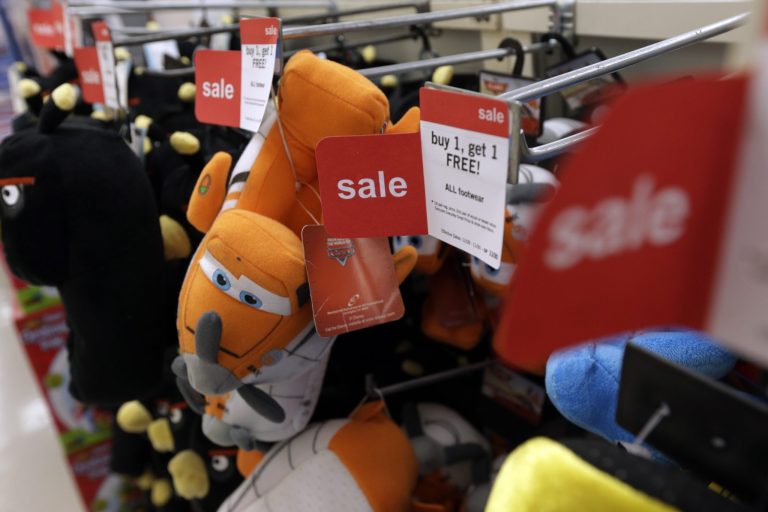 In Thursday, Nov. 28, 2013, photo, slippers are sold at a Kmart in New York. The Labor Department releases Consumer Price Index for December on Thursday, Jan. 16, 2014.  (AP Photo/Julio Cortez)