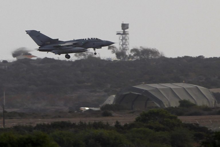 A warplane comes in to land after completed a mission at Britain's Royal Air Force Base in Akrotiri near southern city of Limassol, Cyprus, on Saturday, Sept. 27, 2014. Britain's Ministry of Defense said warplanes have taken off for their first combat mission over Iraq since Parliament approved airstrikes targeting the Islamic State group. The Tornado GR4 aircraft took off from RAF Akrotiri hours after Britain joined the U.S.-led coalition of nations that are launching airstrikes against the extremists. (AP Photo/Petros Karadjias)