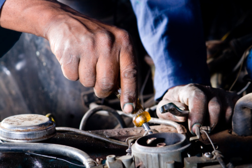 mechanic working on a vehicle