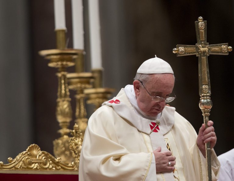 Pope Francis holds the pastoral staff as he celebrates a mass for priests and nuns on the occasion of the feast of the presentation of the Lord, in St. Peter's Basilica at the Vatican, Sunday, Feb. 2, 2014. (AP Photo/Alessandra Tarantino)
