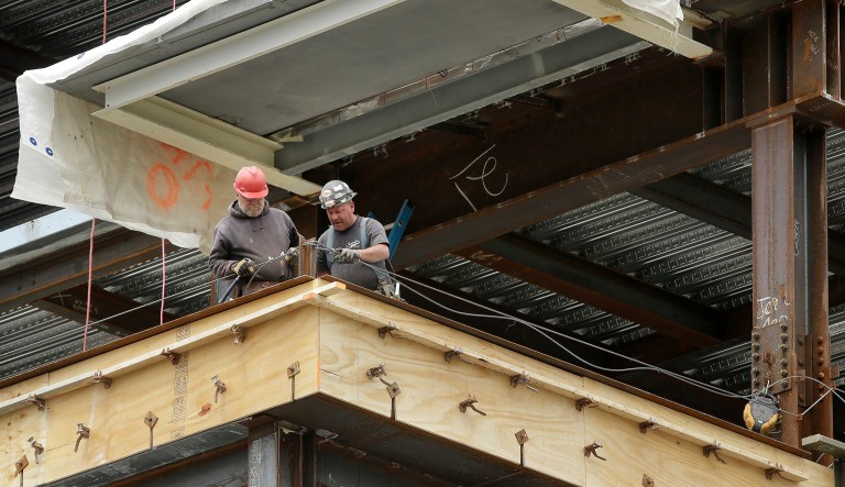 Economists had expected job growth to slow to below 180,000, after a stronger month in June. (AP Photo/Steven Senne)