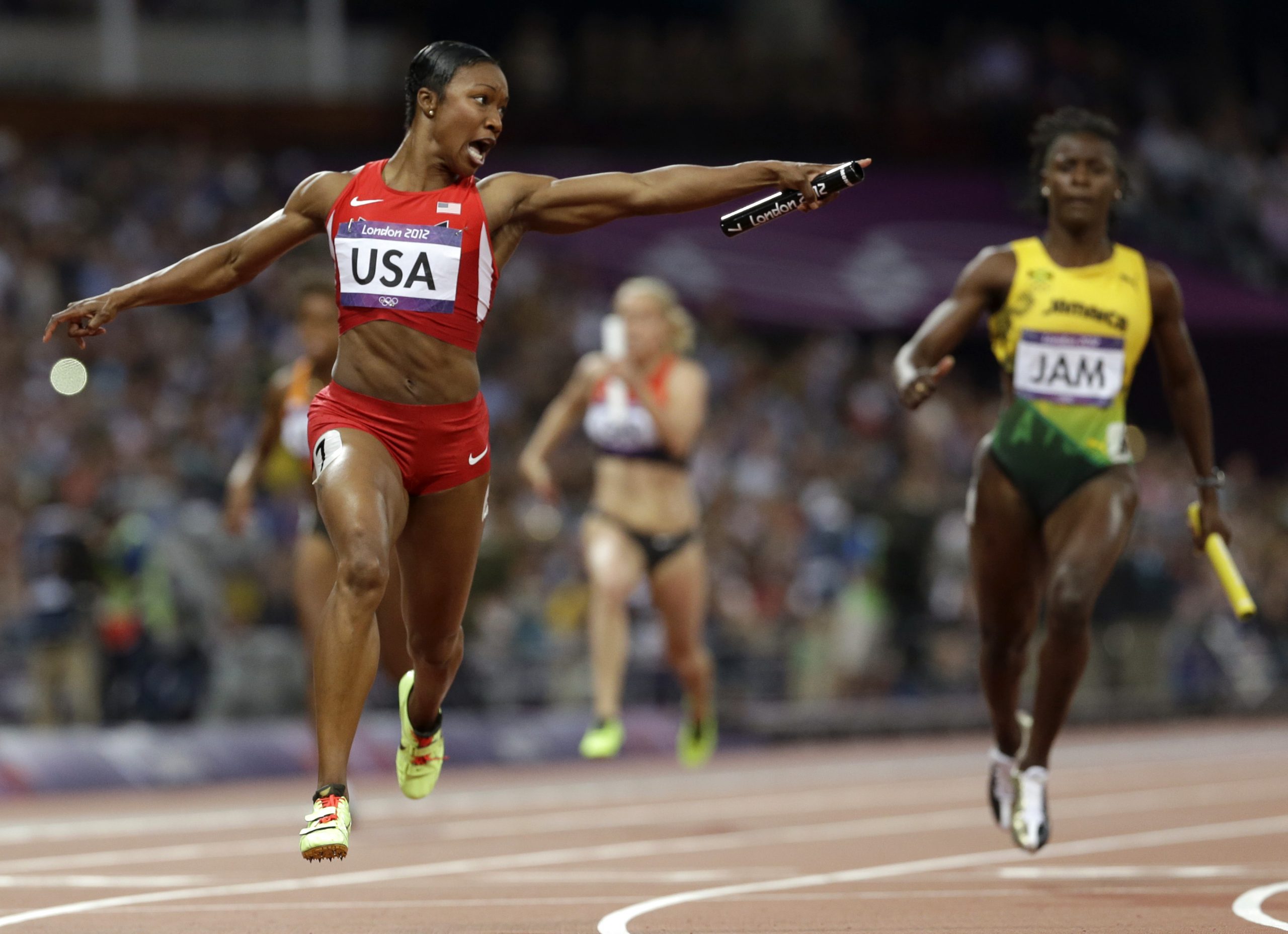 U.S. breaks 27-year-old record in women’s 4×100