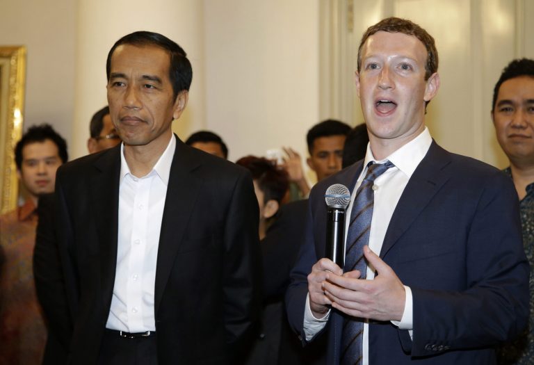Facebook CEO Mark Zuckerberg, right, speaks during a joint press conference with Indonesian President-elect Joko Widodo, left, after their meeting in Jakarta, Indonesia, Monday, Oct. 13, 2014. Zuckerberg and Widodo discussed ways to take advantage of the online social networking service for beneficial of national development. (AP Photo/Achmad Ibrahim)