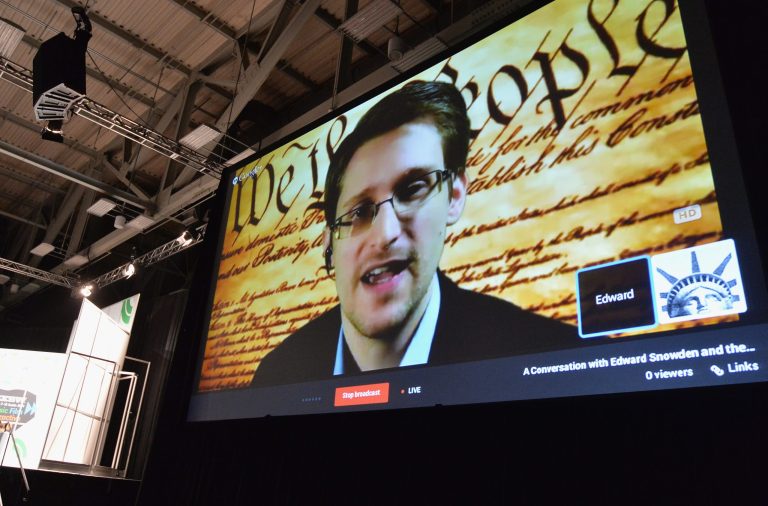 NSA whistleblower Edward Snowden speaks via videoconference at the 'Virtual Conversation With Edward Snowden' during the 2014 SXSW Music, Film + Interactive Festival at the Austin Convention Center on March 10, 2014 in Austin, Texas. (Photo by Michael Buckner/Getty Images for SXSW)