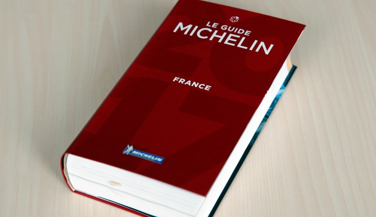 Michelin's annual restaurant guide is commonly regarded as Earth's most prestigious. (AP Photo/Christophe Ena)