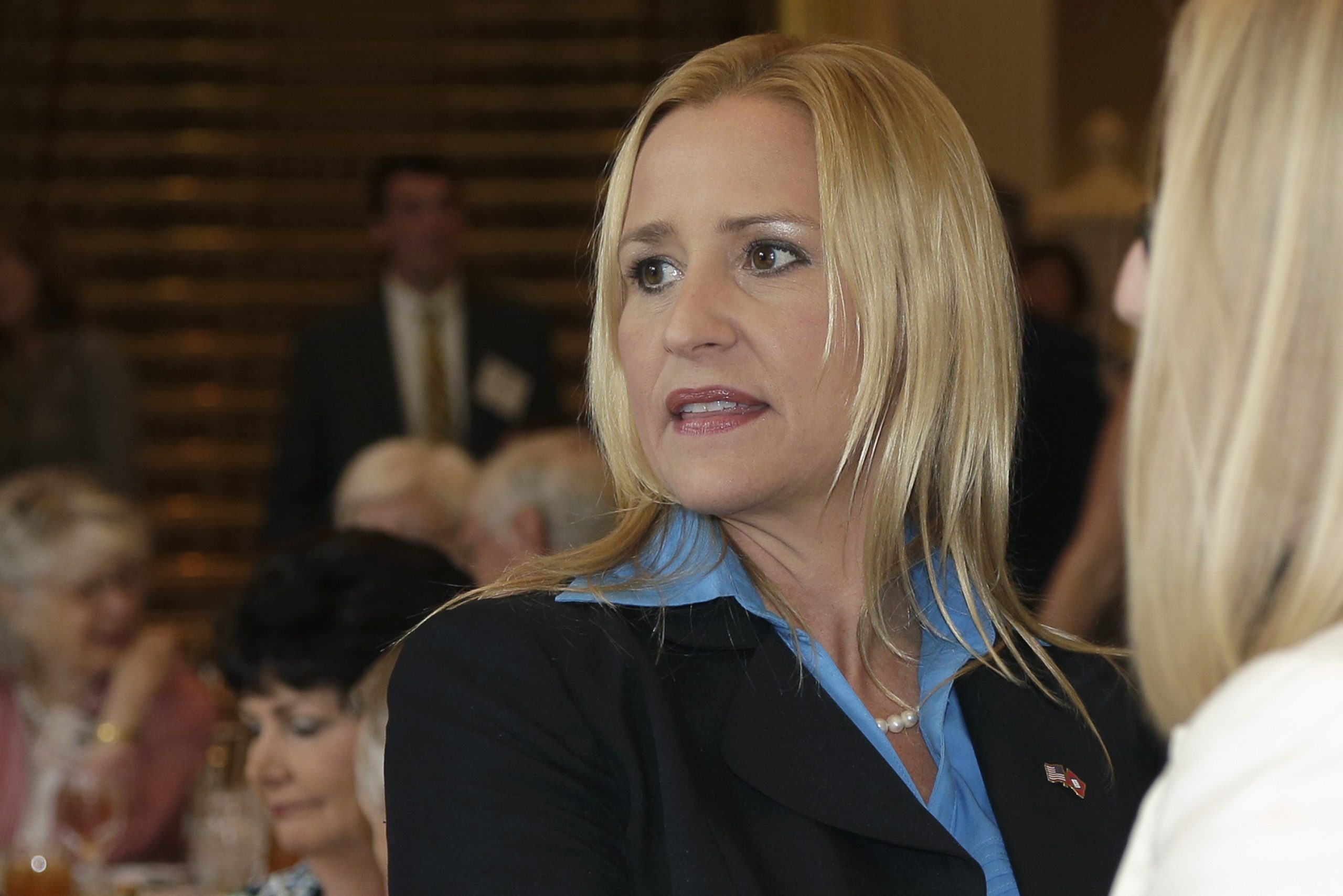 Ark. county clerk defends taking AG candidate’s voter card