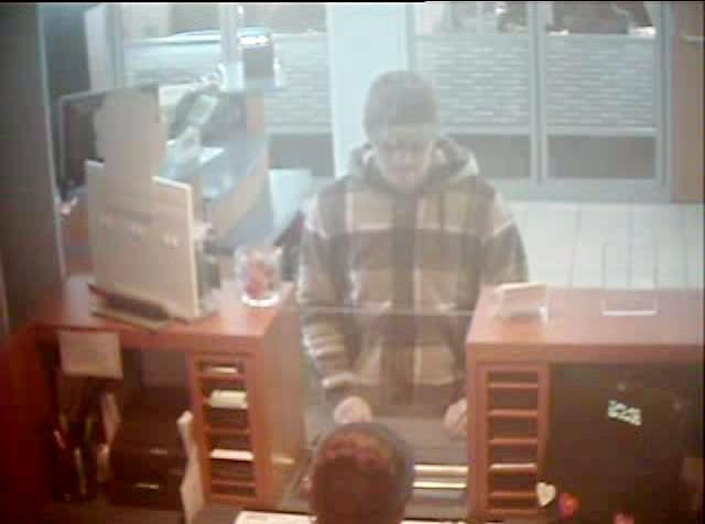 Suspect robs Woodbridge bank, flees in stolen car