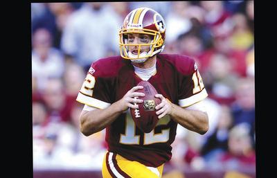 Patrick Smith/Getty Images
John Beck returns to play against the Dolphins, the team that drafted him in the second round and cut him after two seasons.
