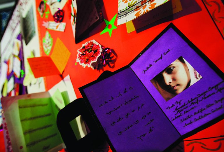 Cards are presented on a board by Pakistani students, not pictured, to support 14-year-old schoolgirl Malala Yousufzai, who was shot last Tuesday by the Taliban for speaking out in support of education for women, during a tribute at the Pakistani Embassy in Abu Dhabi, United Arab Emirates. Pakistan airlifted a 14-year-old activist who was shot and seriously wounded by the Taliban to the United Kingdom for treatment Monday, a move that will give her access to the specialized medical care she needs to recover and also protect her from follow-up attacks threatened by the militants. (AP Photo/Kamran Jebreili)