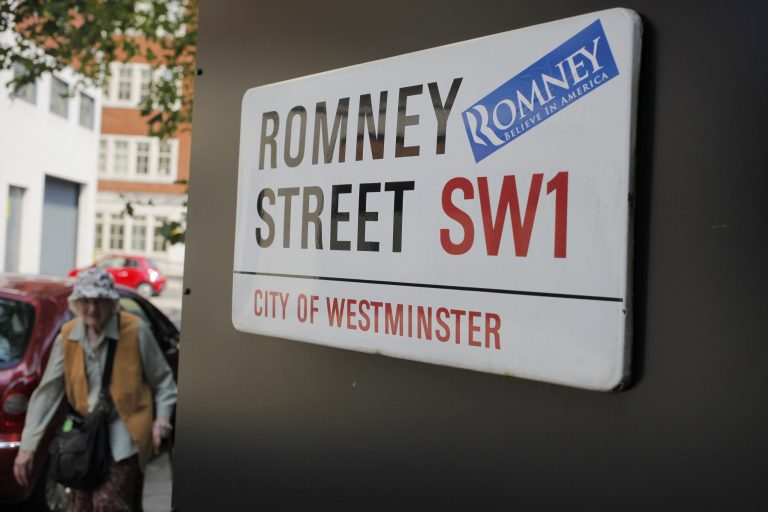 A campaign sticker for Republican presidential candidate Mitt Romney is seen on a street sign for Romney Street in London, Wednesday, July 25, 2012, as Romney arrives in London to meet with world leaders, hold fundraisers, and attend the opening of the Olympic games. (AP Photo/Charles Dharapak)