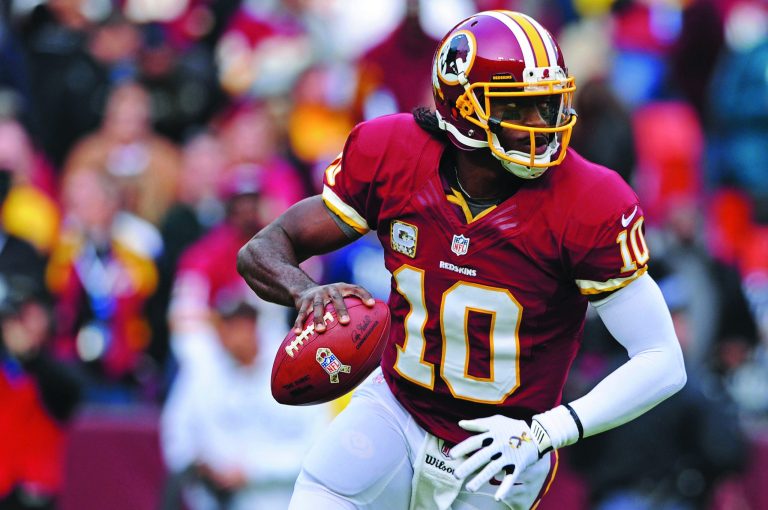 Patrick Smith/Getty Images
Rookie quarterback Robert Griffin III said his father provides input after every game whether the Redskins win or lose.