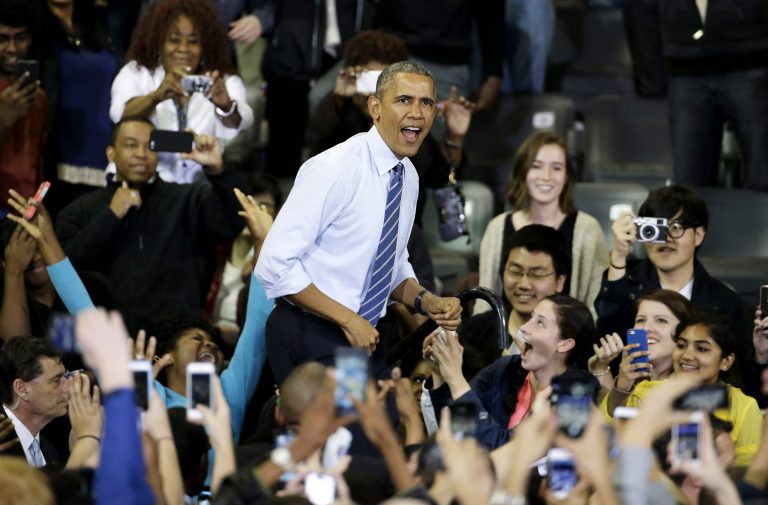President Barack Obama takes the stage to speak at Georgia Tech, Tuesday, March 10, 2015, in Atlanta. More than 40 million Americans are in debt thanks to their education, and most of their loans come from Uncle Sam. So President Barack Obama is aiming to clamp down on the private companies that service federal student debt with a presidential memorandum he signed Tuesday. (AP Photo/David Goldman)