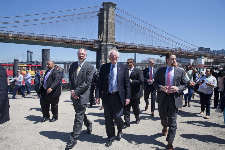 Democratic presidential candidate Bernie Sanders, I-Vt., and his son Levi Sanders, left, take a walk in the Brooklyn Bridge park in the Brooklyn borough of New York. (AP Photo/Mary Altaffer)