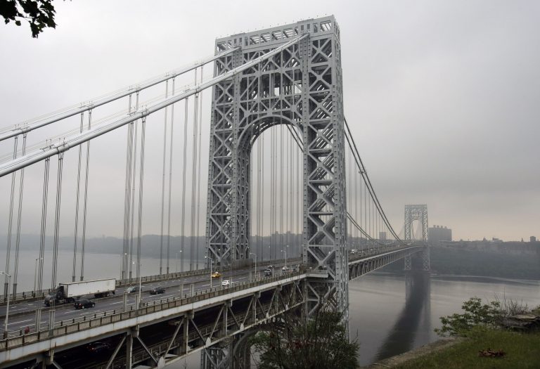 Traffic moves across the George Washington Bridge, in Fort Lee, N.J. A top aide to New Jersey Gov. Chris Christie is linked through emails and text messages to a seemingly deliberate plan to create traffic gridlock in a town at the base of the bridge after its mayor refused to endorse Christie for re-election. 