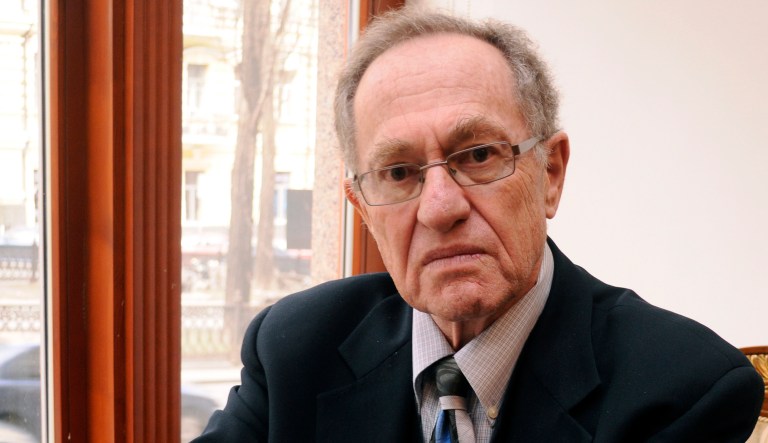 Alan Dershowitz, a professor at Harvard Law School, suggested that Trump's former foreign policy adviser during the presidential campaign may have worn a wire to help the special counsel's Russia investigation. (AP Photo/Sergei Chuzavkov)