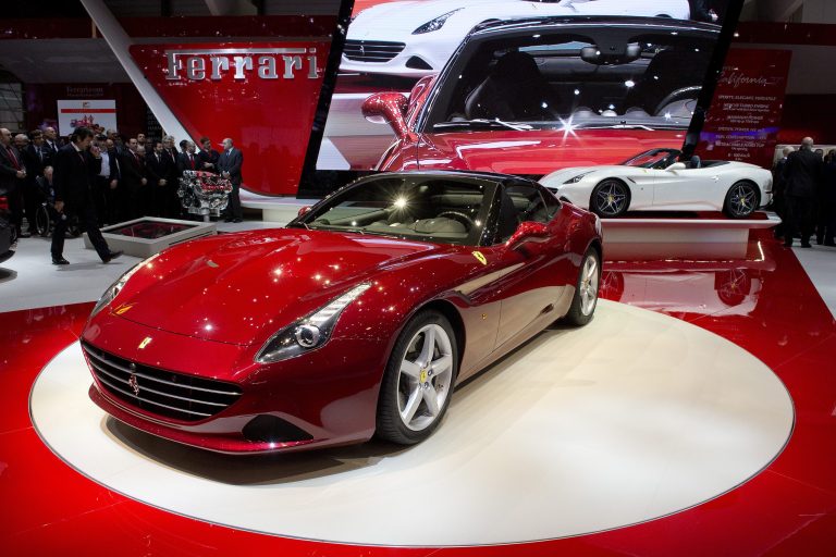 The New Ferrari California T is  is on display  at the 84.  Geneva International Motor Show in Geneva, Switzerland, Tuesday, March 4, 2014.  (AP Photo/ Keystone,Sandro Campardo)