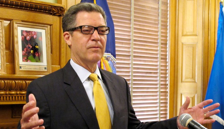 Gov. Brownback remains committed to preserving welfare for the truly needy while expanding job creation throughout the state. (AP Photo/John Hanna)