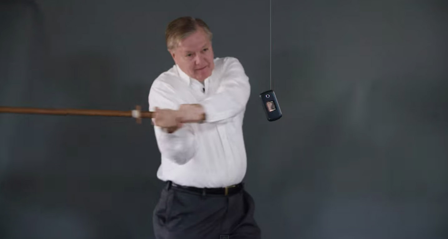 Watch: Lindsey Graham responds to Trump by destroying cellphones