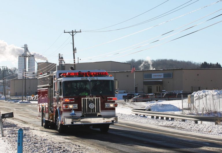 In this photo from Jan 31, 2014, a firetruck rolls past Mersen USA where an explosion killed one person and injured two in St. Marys, Pa. Federal safety officials said a worker wrongly put parts coated with flammable materials into an electric oven before it exploded at the plant, killing a visiting employee. (AP Photo/ Dubois Courier Express-JoAnn Seltzer)