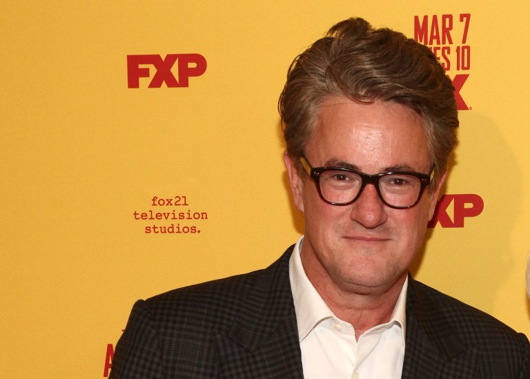 Joe Scarborough says his show maintains access to the White House and is watched despite criticizing Trump. (Photo by Andy Kropa/Invision/AP)