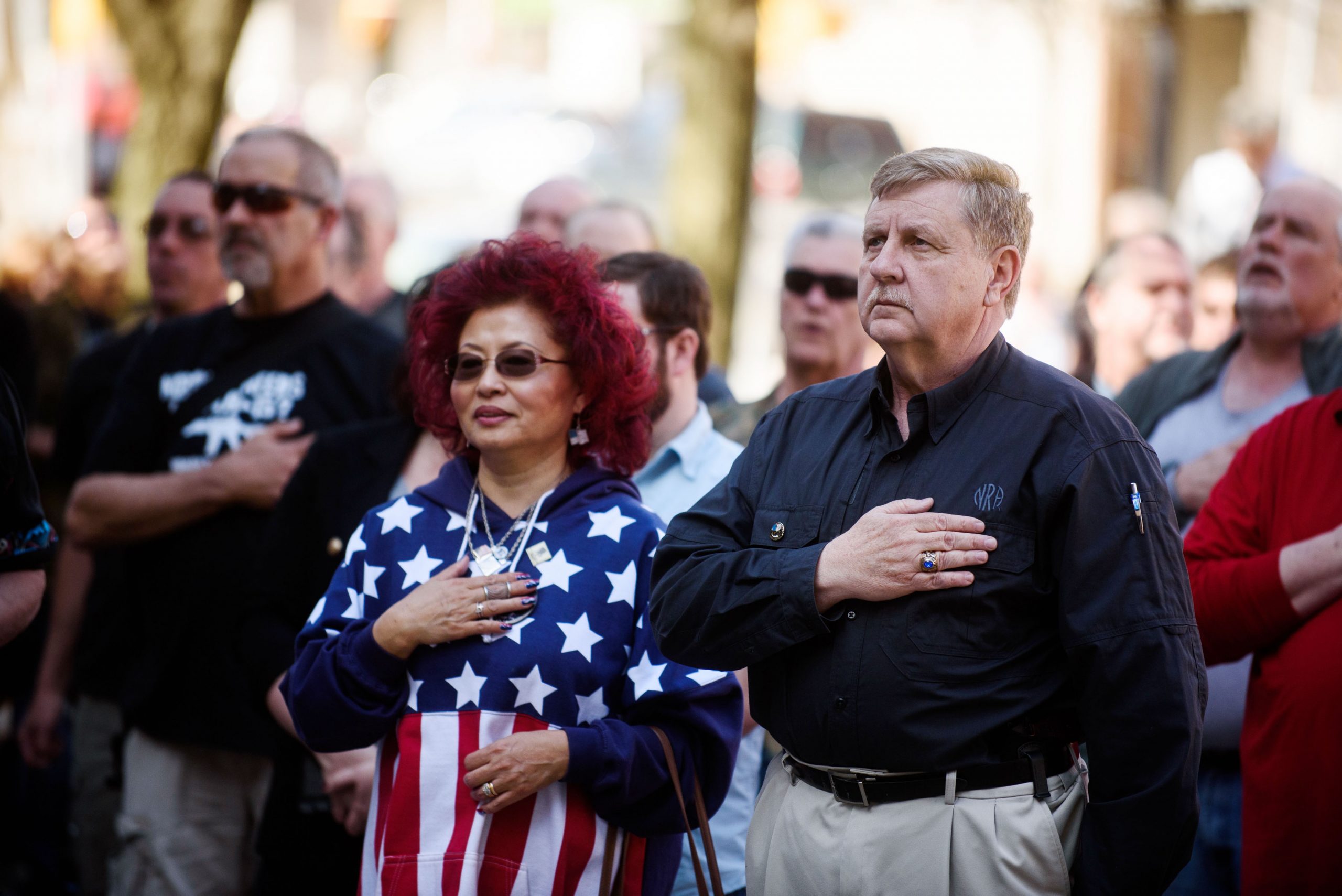 Republican candidate for Congress Rick Saccone (pictured right) and his wife, Yong, join a rally to support Martin Palla and gun rights on April 22 in the courtyard of the Westmoreland County Courthouse in Greensburg, Pa.