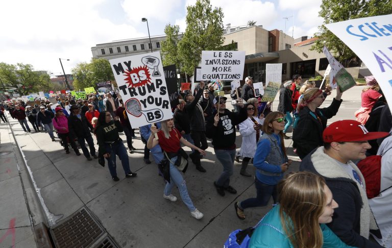 The more we allow this brand of messaging to dominate, the more we sacrifice scientific prestige to partisan politics. (AP Photo/David Zalubowski)
