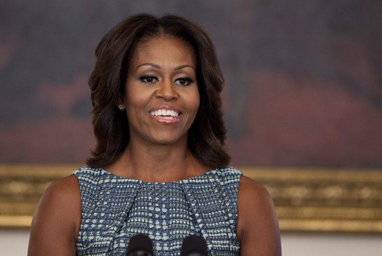 First lady Michelle Obama pausess during an event about food marketing to children in the State Dining Room of the White House on Wednesday, Sept. 18, 2013, in Washington. Obama wants food makers and entertainment companies to spend less time advertising sweet and salty foods to kids and more time promoting healthier options.