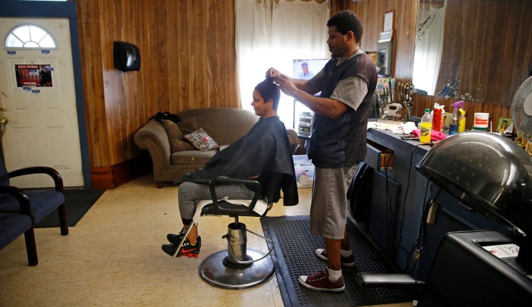 Licensing is generally justified on the grounds of public safety or fraud protection. But while it makes sense to license people in fields such as healthcare, many local governments regulate careers in which the public benefit is harder to justify: beauticians, tour guides, and tax preparers, among others. (AP Photo/Gerald Herbert)