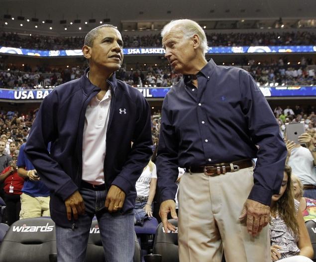 President Obama and Vice President Joe Biden at a basketball game. AP Photo