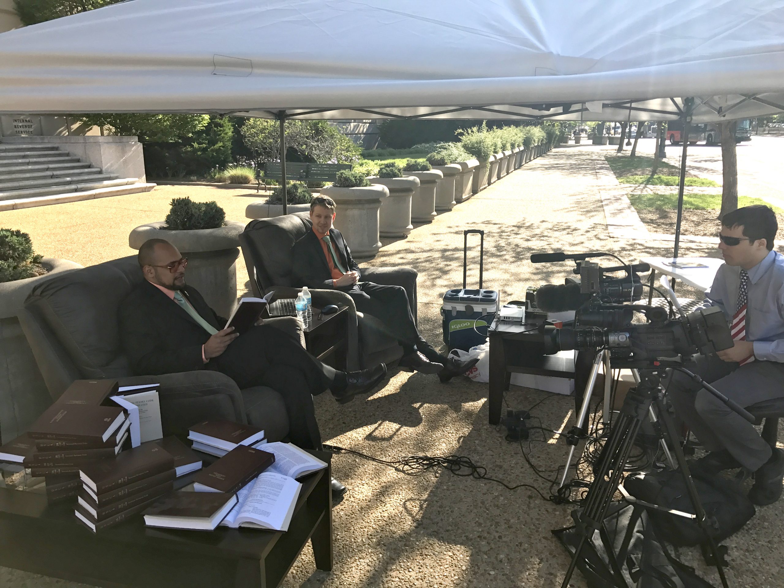 Group protests Tax Day by reading US tax code outside IRS building