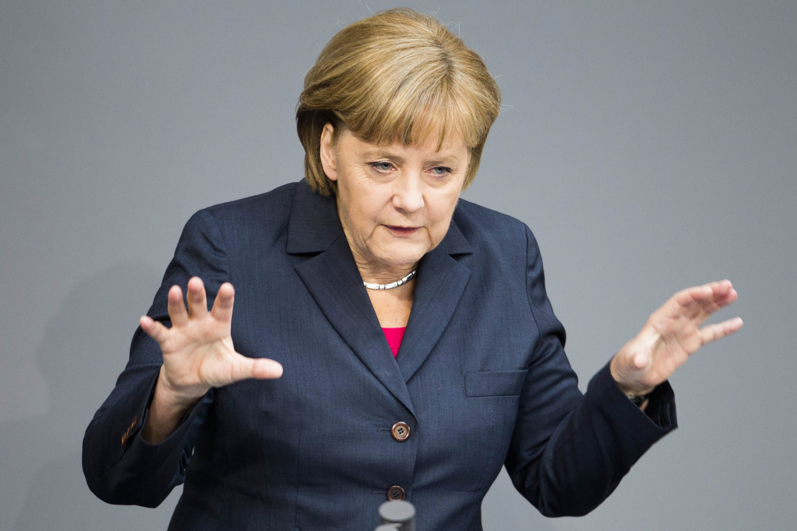 Europe crisis spreads as Merkel resists big steps