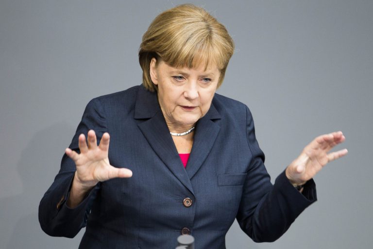   German Chancellor Angela Merkel delivers a speech to discuss Germany's position prior to the upcoming G20 summit at the Bundestag in Berlin, Germany, Thursday, June 14, 2012. Merkel acknowledged Thursday that Europeâs lingering debt crisis will dominate this weekendâs summit of the worldâs 20 most important economies in Mexico, while reiterating her conviction that the crisis can only be solved through a combination of fiscal tightening and structural reforms. (AP Photo/Markus Schreiber)  