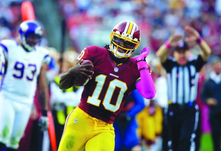 Pablo Martinez Monsivais/AP
Robert Griffin III ran 138 yards, but he kept himself out of trouble by going out of bounds or going down before he could be hit.