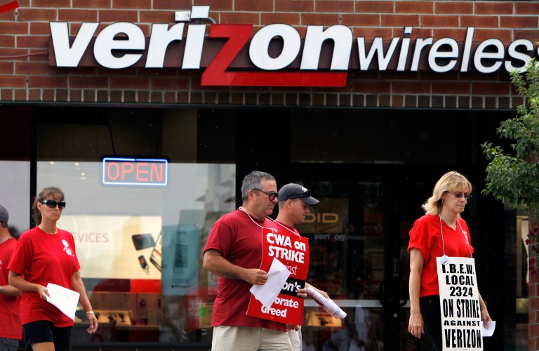 Union workers are pushing Verizon to improve benefits and limit outsourcing in a new contract. (AP Photo/Mike Groll)