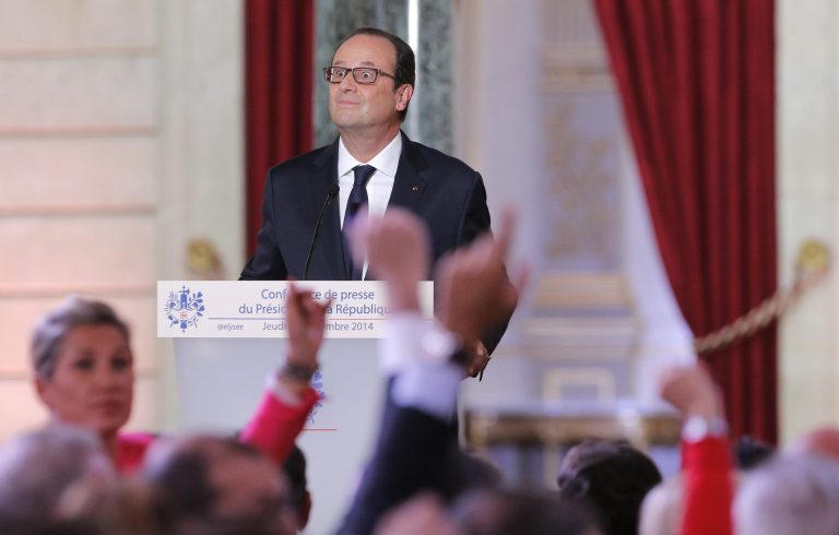 French President Francois Hollande waits for questions during a press conference at the Elysee Palace, Thursday, Sept.18, 2014. Hollande said he agreed to Iraq's request for air support at a meeting of his top defense and security advisers earlier Thursday. (AP Photo/Christophe Ena)
