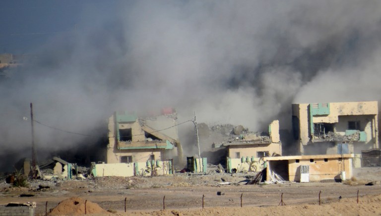 The airstrikes targeted a manned Islamic State checkpoint, according to the Central Command report. (AP Photo/Osama Sami)